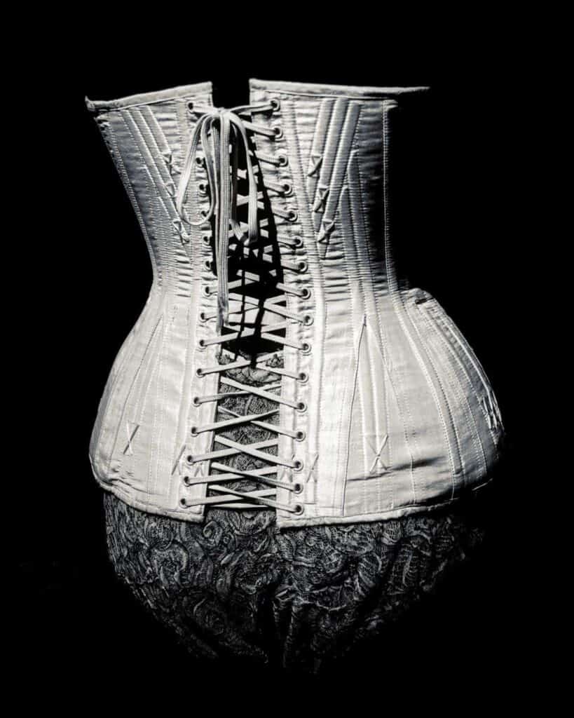 Black and White image of a corset designed by Jean Paul Gaultier