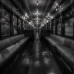 black and white image of a subway car interior at the NYC Transit Museum - Brooklyn, New York City