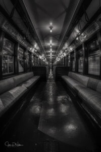 black and white image of a subway car interior at the NYC Transit Museum - Brooklyn, New York City