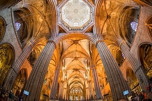 The old cathedral in El Barri Gotic| Barcelona Cathedral Interior | EXIF Information: f/3.5 1/20sec ISO-100 15mm © 2023 John Patrick Hoke