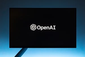 OpenAI logo on computer monitor